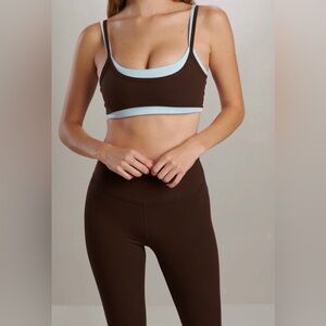 Brown and Light Blue Women's Sports Bra and  leggings.
New with out tag.